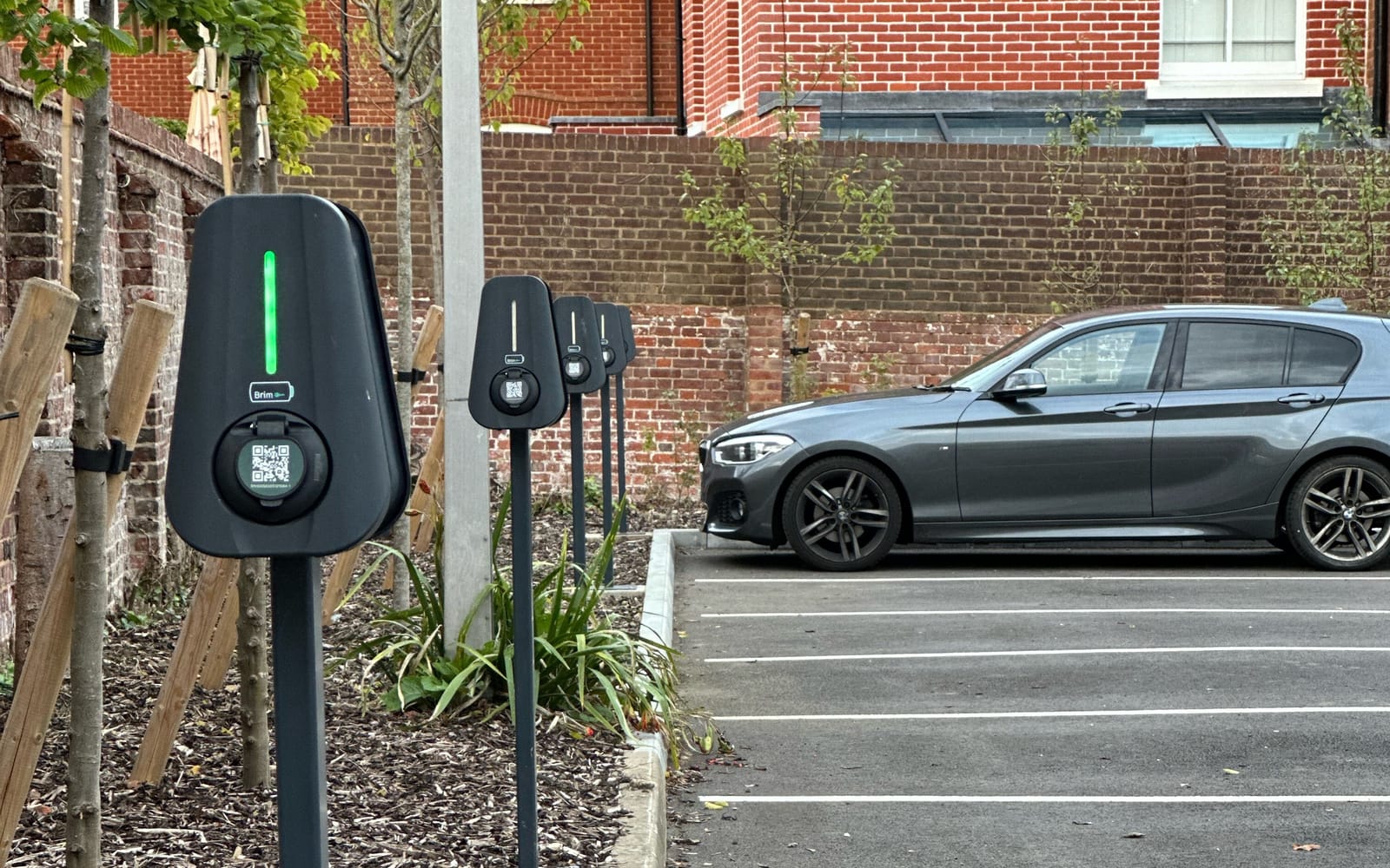 Brim chargers on posts in a public car park